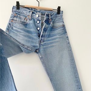 Vintage Levi’s 501 Jeans Button Fly 26x30 made in 90s Soft faded blue vintage